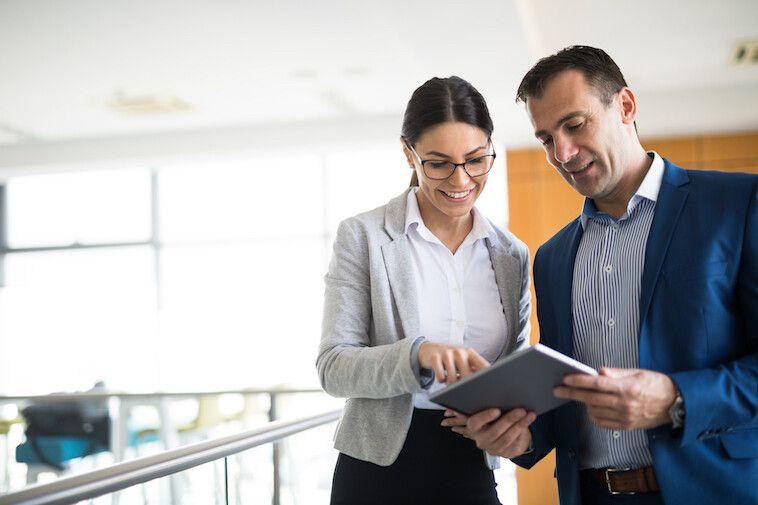 Two professionals using Chrome River Expense