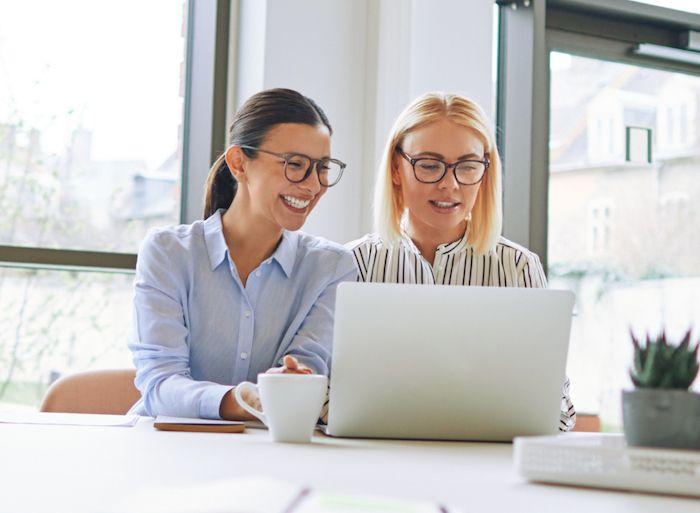 Two woman working from the computer